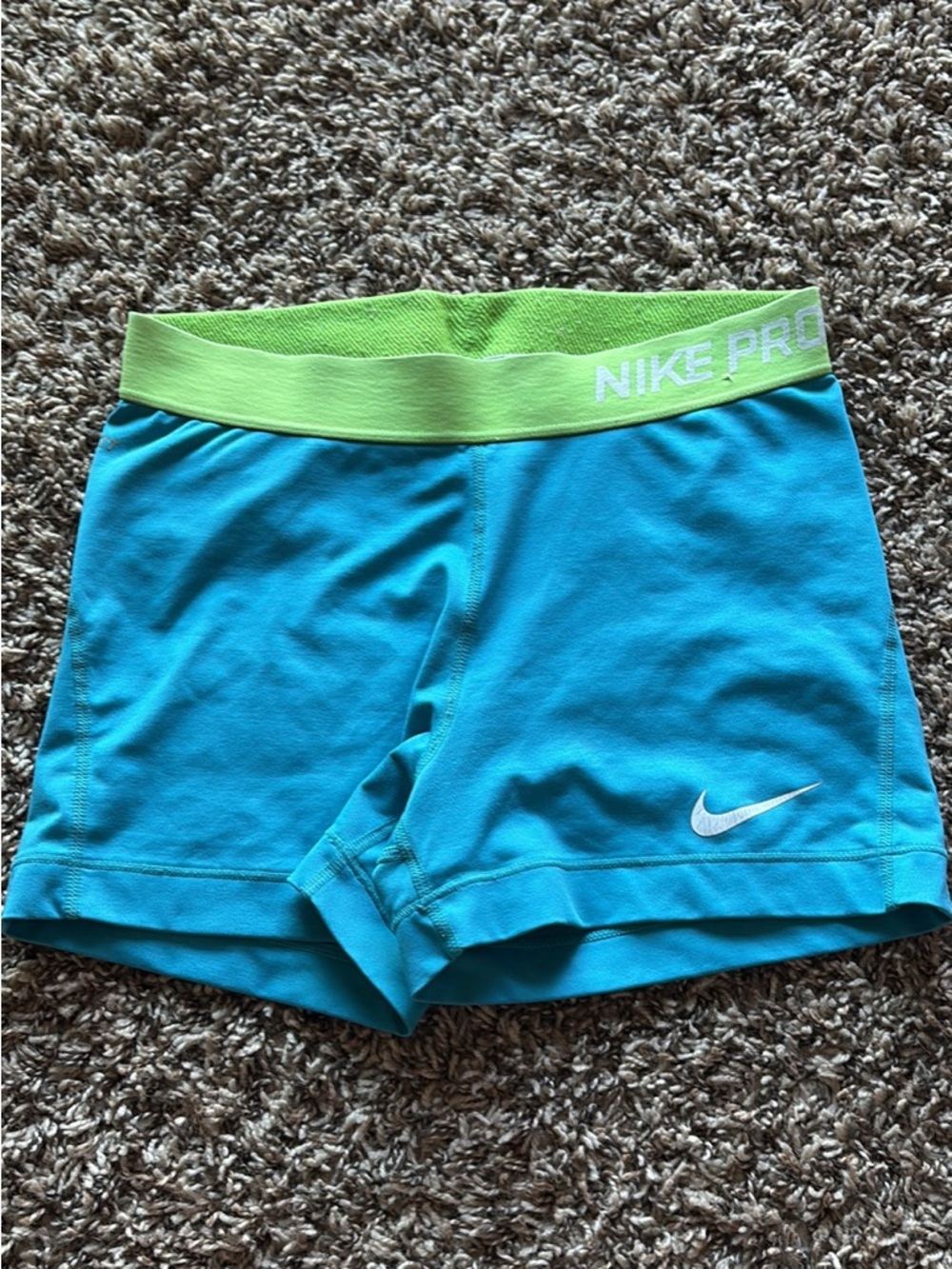 Nike Pro Turquoise Shorts with Lime Green Waistband and White Logo